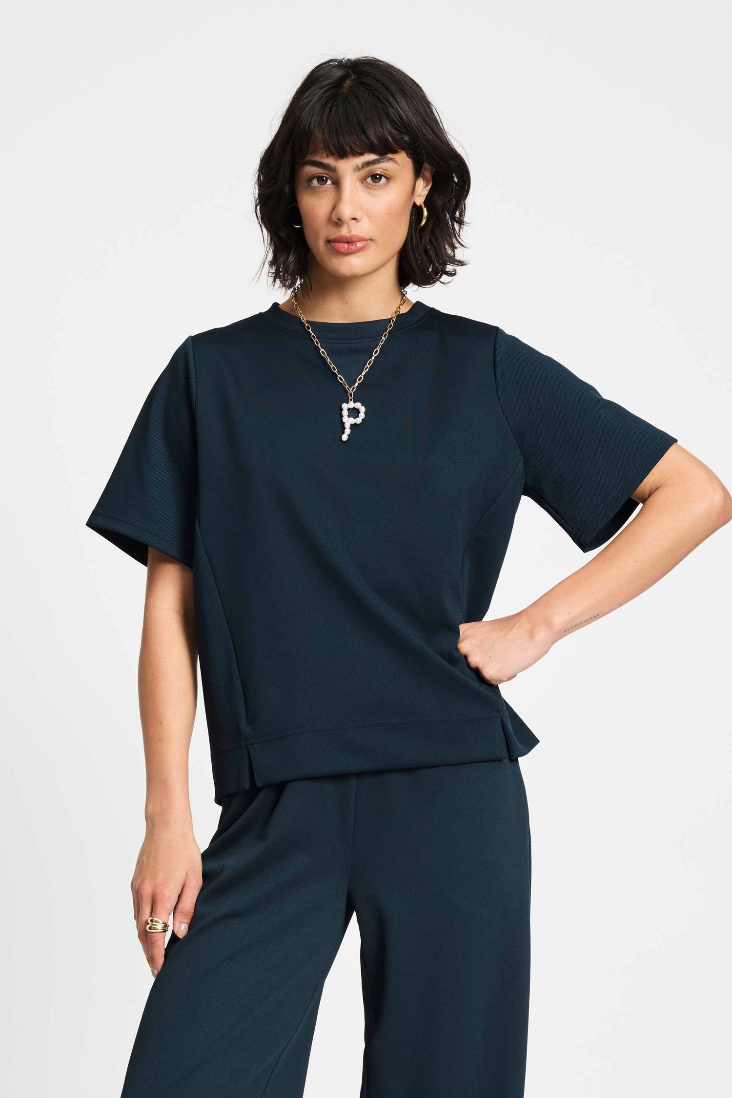 Hergestellt aus: Recyceltem Polyester